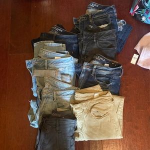 8 pairs of american eagle jeans sizes 6-8 (one size 2)